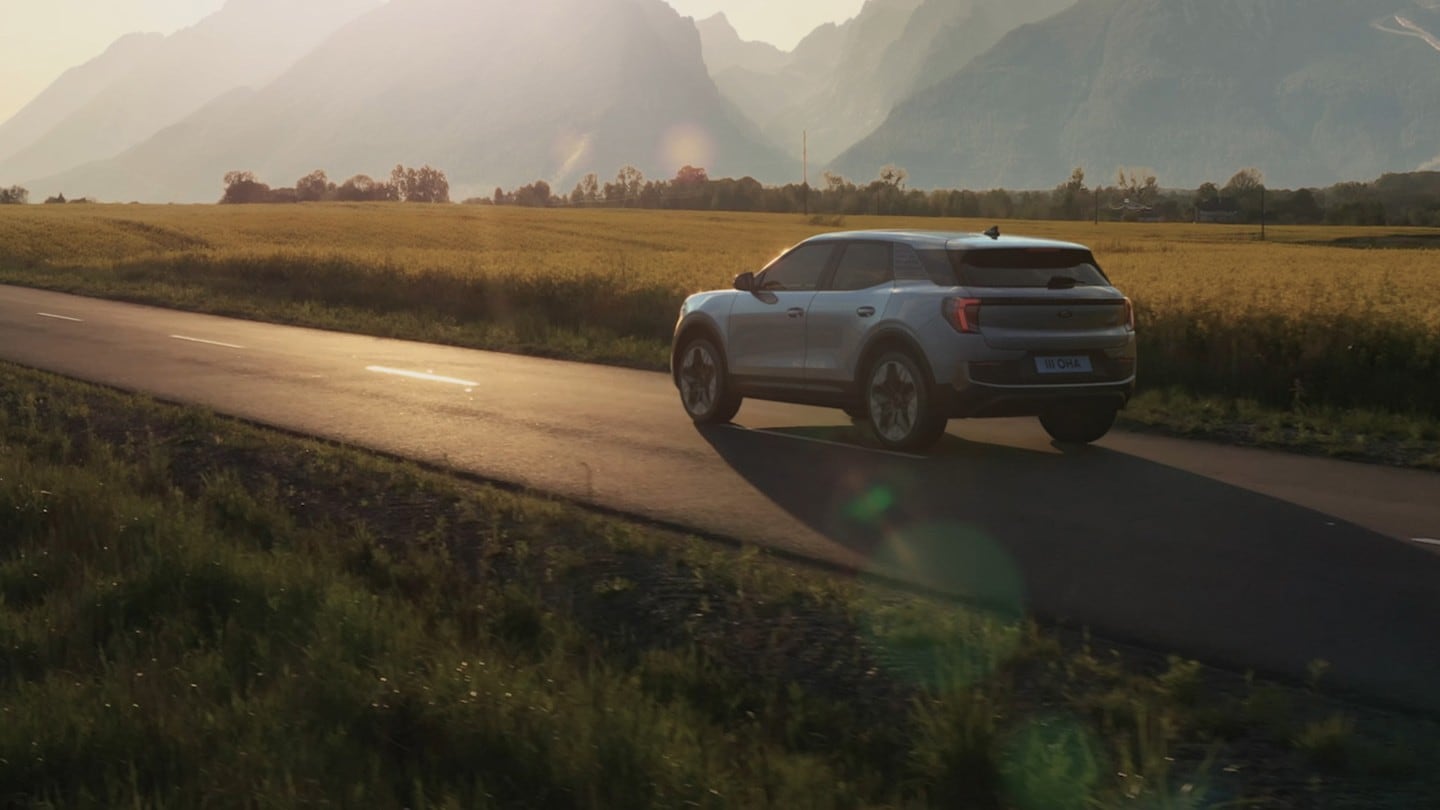 The all-new electric Ford Explorer driving in the countryside