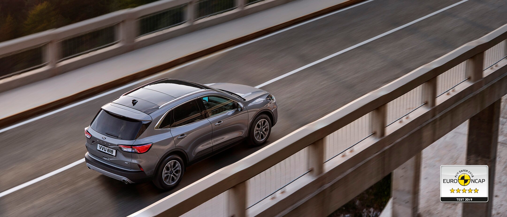 Ford Kuga overhead view driving on bridge