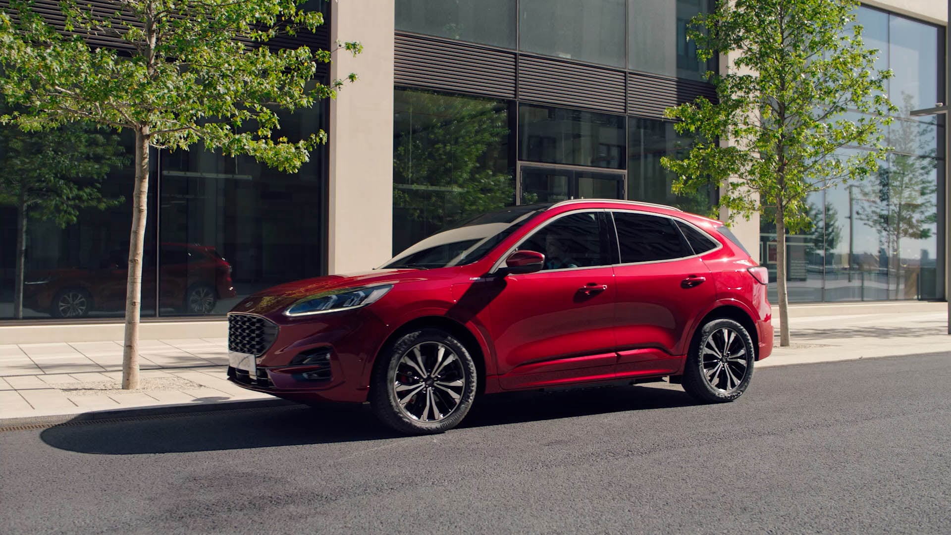 New Ford Kuga side view parked in street