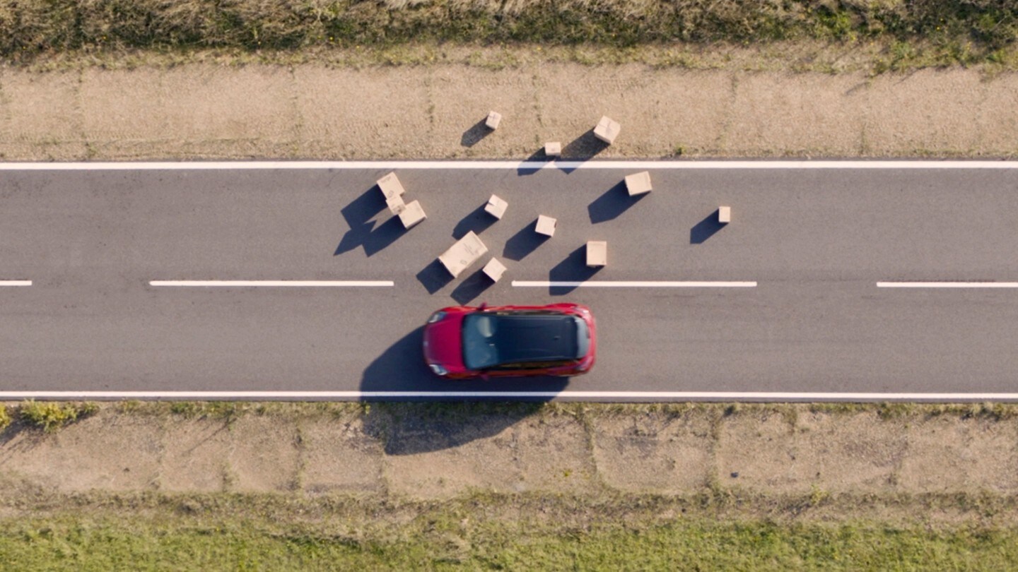 Ford Kuga avoiding hazards on road