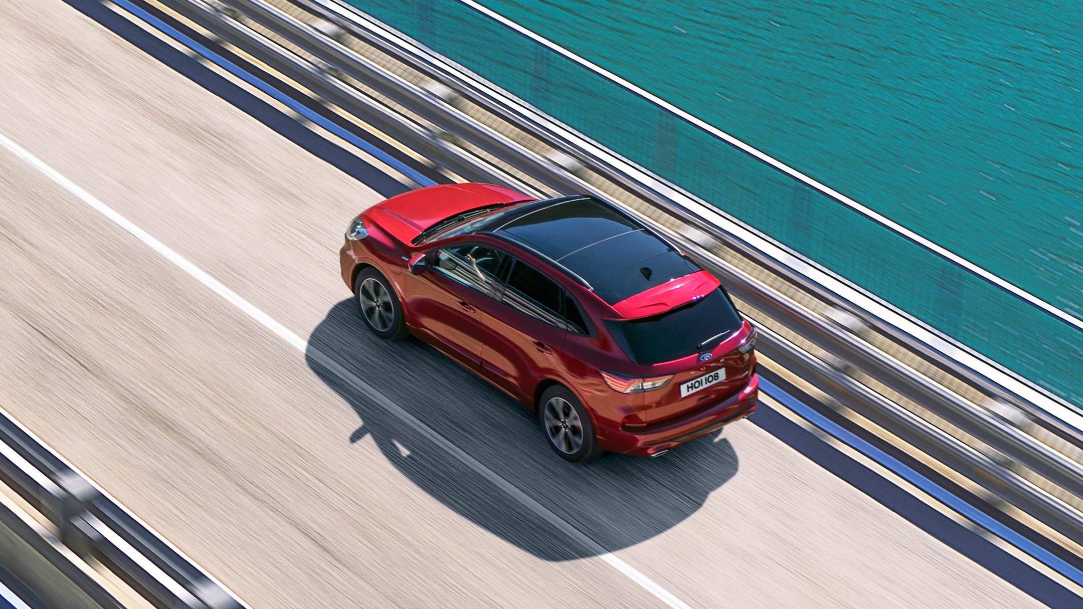 Ford Kuga driving over bridge