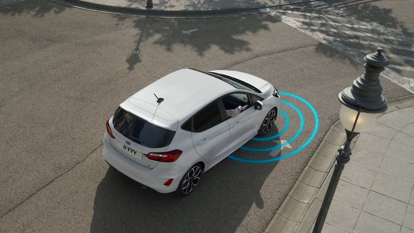 Ford Fiesta rear three quarter view with lane-keeping graphic