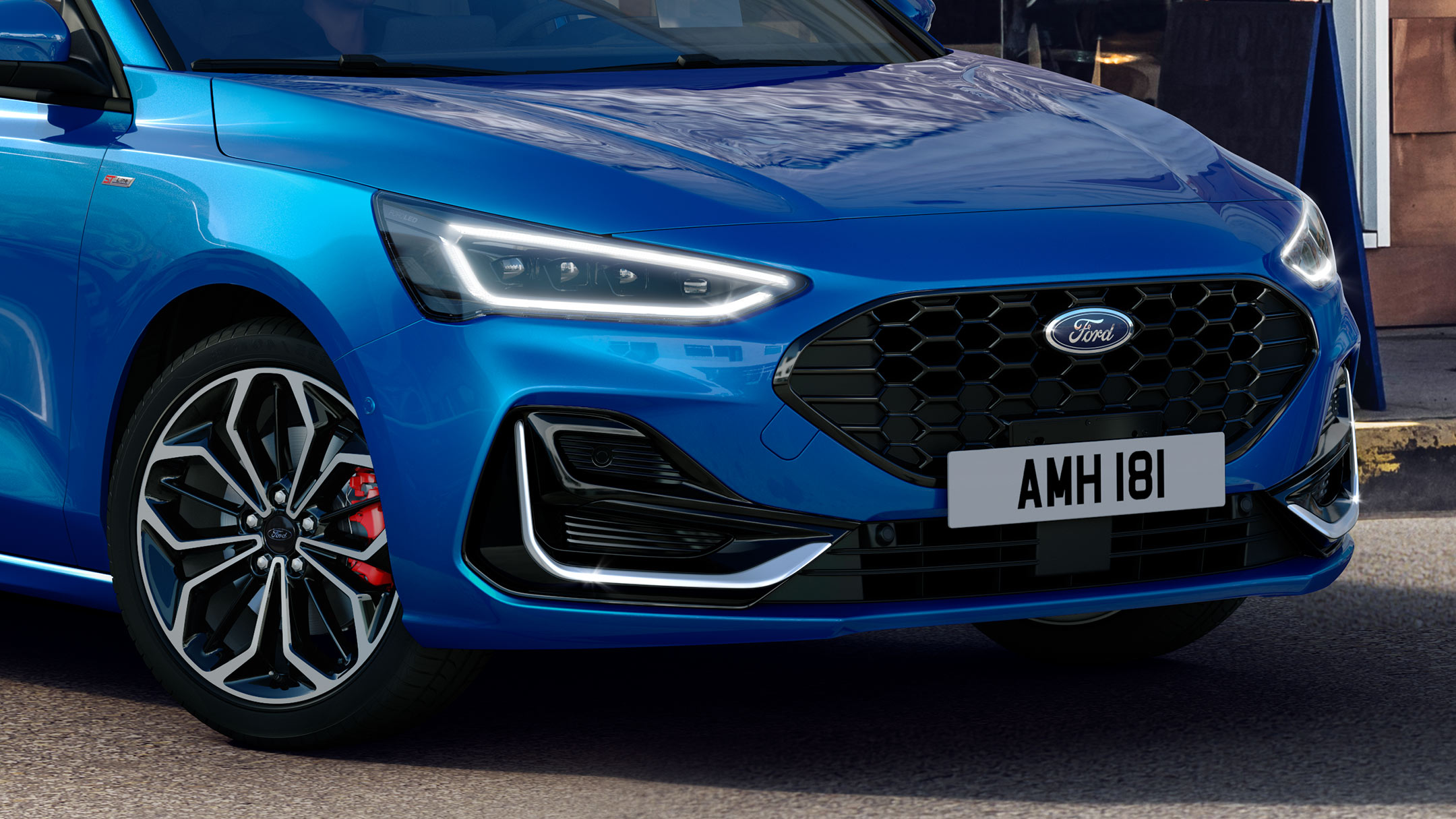 Front view of a blue Ford Focus