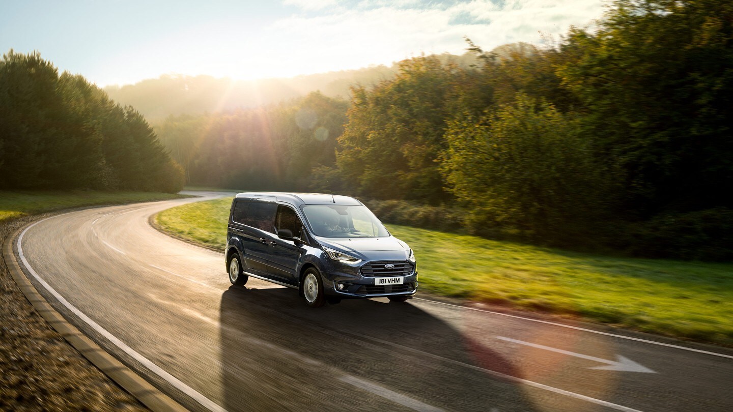 New Blue Ford Transit Connect driving