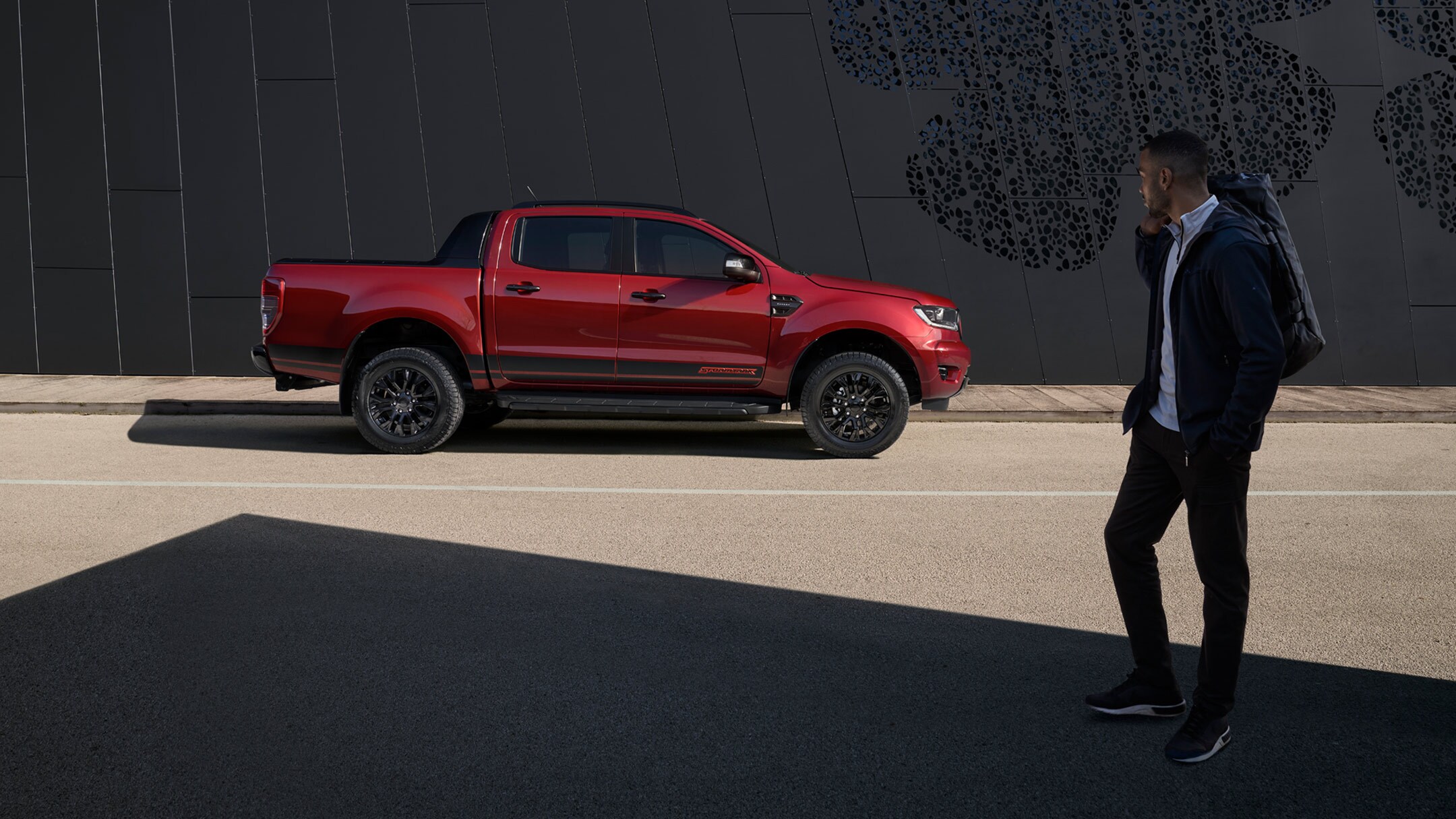 Ford Ranger Stormtrak side view with man nearby