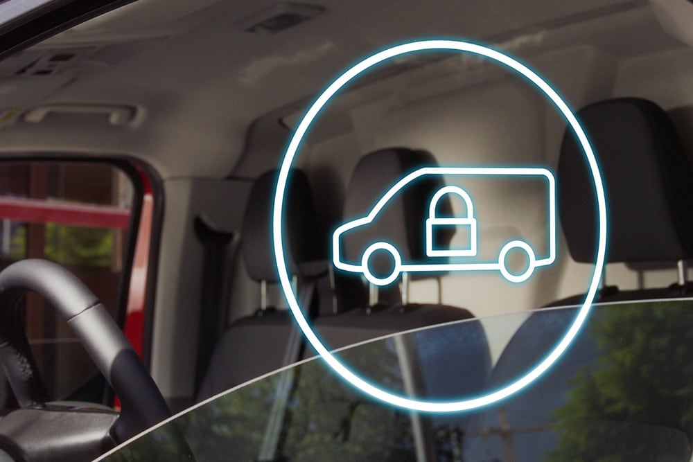 Icône de fourgon verrouillé affichée sur le pare-brise d'un Ford Transit Custom.