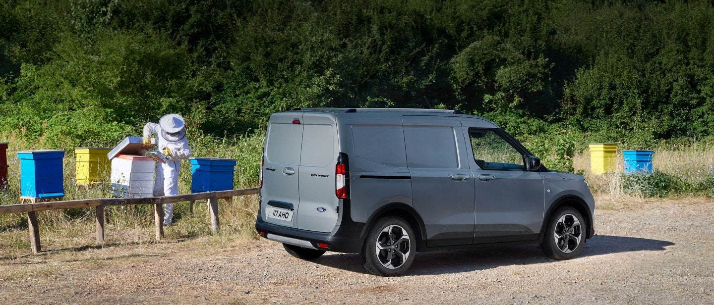 Ford Transit Courier parked in nature