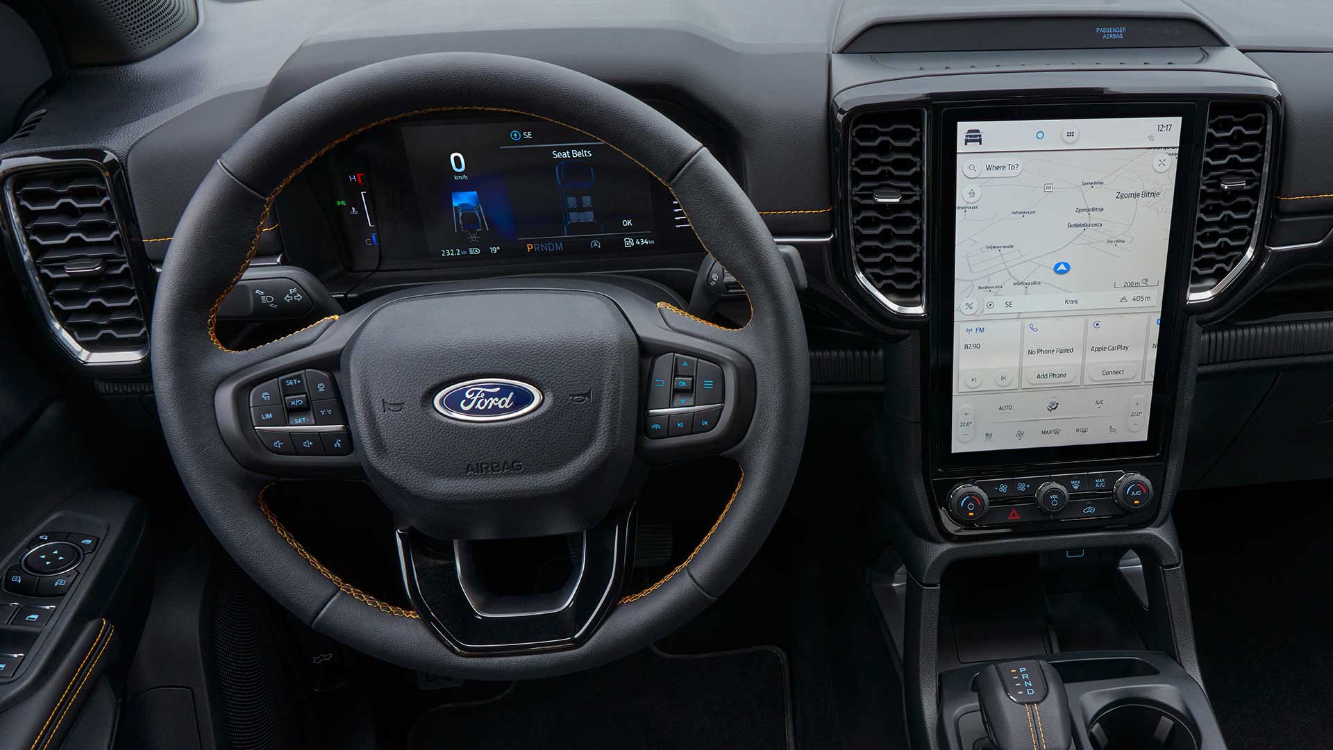Vue intérieure du volant du Ford Ranger et de l'écran tactile central SYNC™ 4 de 12 pouces.